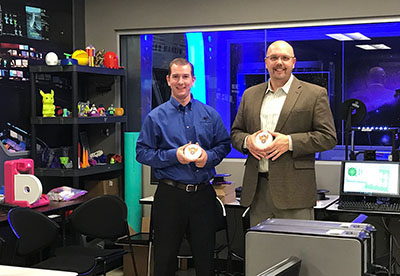 Photo of Elias Molen and Bryan DeBates with their medals