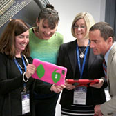 Photo of teachers looking at iPad
