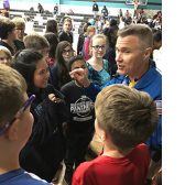 Photo of astronaut Digger Carey with students