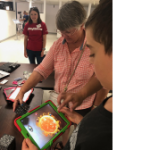 Raytheon employee with Merge Cubes