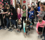 Students launching straw rockets