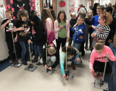 Students launching straw rockets